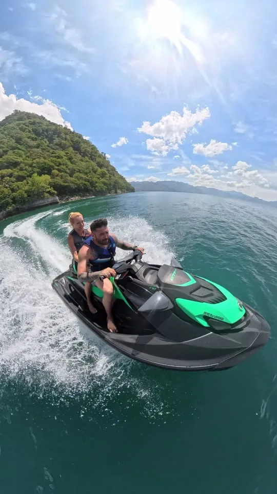 Couple on a jet ski on Lake Atitlán, Guatemala