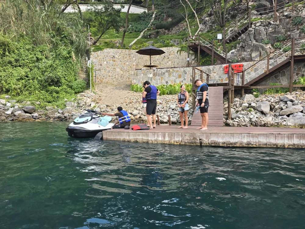 Riders with life jackets on the Santa Cruz dock