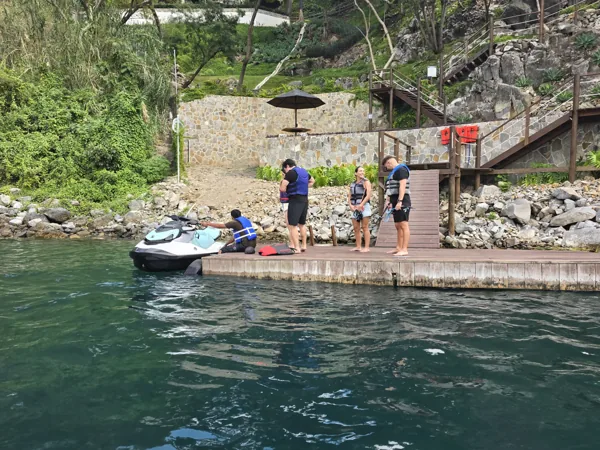 Riders with life jackets on the Santa Cruz dock